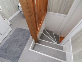 A bathroom with stairs and a toilet at The Studio on the Crescent in Whitby