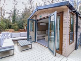 A living room with a sofa and coffee table at Wild Duck Holiday Park Belton Norfolk