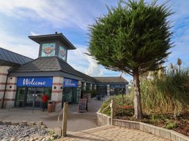A building entrance with a welcome sign at Littlesea Holiday Park - Holiday Accommodation 13127, Weymouth