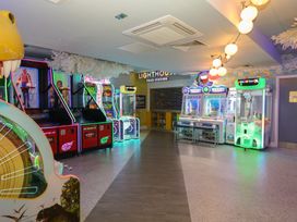 An arcade with various gaming machines at Pine Tree Lodge - Shorefield Country Park, Milford On Sea