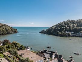 A view of water with boats and hills at Fastnet at Nonsuch House Dartmouth