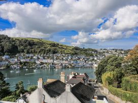 A view of houses and water at Fastnet at Nonsuch House Kingswear, Devon