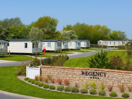 A view of caravans and greenery at Regency Park in Blackpool
