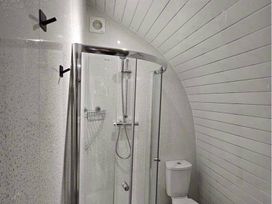 a bathroom with a shower and toilet at Standen Lodge - Holiday Accommodation 19045, Mablethorpe