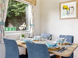 A dining room with a table set for meals at Lido Leisure Park - Holiday Accommodation 19726, Knaresborough
