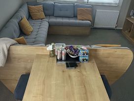 A living room with a couch and table at Whitley Bay Holiday Park - Holiday Accommodation 19754 in Whitley Bay