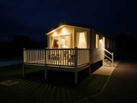 A holiday accommodation with a deck and steps at Lakeland Leisure Park - Holiday Accommodation 20349 in Grange-Over-Sands