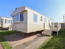 A mobile home with steps and windows at Golden Sands Kinmel Bay - 20528 Rhyl