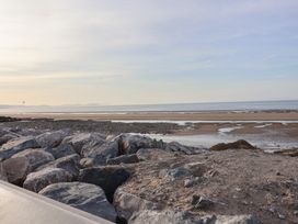 A seascape with rocks and sand at Golden Sands Kinmel Bay - 20528 Rhyl