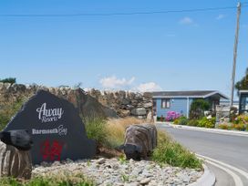 A stone sign for Away Resorts Barmouth Bay at Barmouth Bay Holiday Village in Talybont