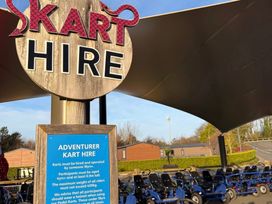 Kart hire sign with go-karts at Hafan y Mor Haven - Holiday Accommodation 22224 Pwllheli