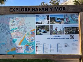 A map of Hafan y Mor with activities and QR code for more information at Hafan y Mor Haven - Holiday Accommodation 22224 Pwllheli