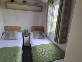 A bedroom with two beds and a window at Butlins Minehead - Holiday Accommodation 22343, Minehead