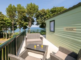 An outdoor space with seating and table at St Andrews Holiday Park - Holiday Accommodation 2944 St Andrews
