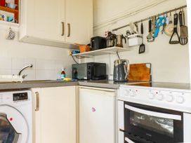 A kitchen with appliances and utensils at Harford