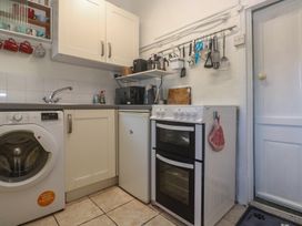 A kitchen with appliances and utensils at Harford in Goldsithney
