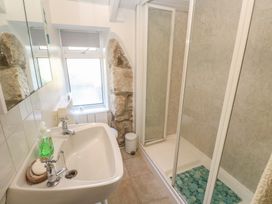 A bathroom with a sink and shower at Harford in Goldsithney