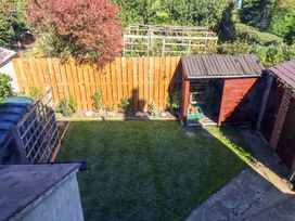A garden with a lawn and a shed at 22 The Lane Saltburn-by-the-Sea
