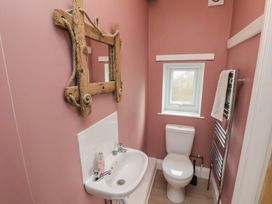 A bathroom with a sink and toilet at The Manse in Whitby