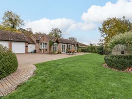 A house with a garage and garden at Dovecote Cottage Corse near Gloucester