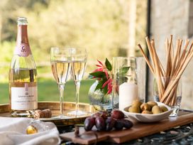 A table setting with drinks and snacks at The Allensford in Slaley