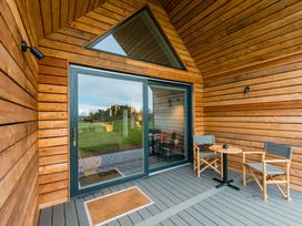 An outdoor area with a table and chairs at The Weir in North Berwick