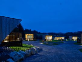 Multiple cabins with lights at Orka 1.0 Spa (Pet) Dumfries