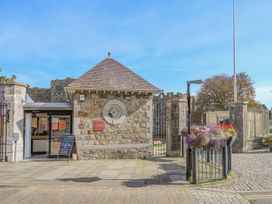 A public building with a door and sign in Llanfairpwllgwyngyll