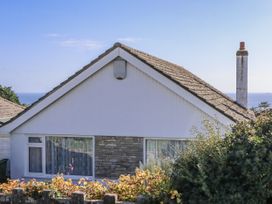 A house with a chimney and window at Woodbury Teignmouth