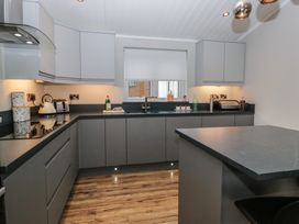 A kitchen with a kettle and toaster at 7 Lake View in Windermere