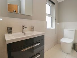 A bathroom with a sink and toilet at 7 Lake View in Windermere