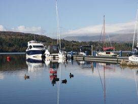 A marina with boats docked at 7 Lake View in Windermere