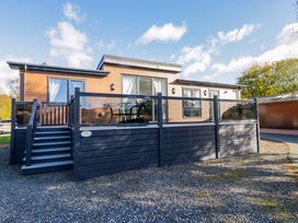 An outdoor area with a deck and steps at 7 Lake View, Lake View 7, White Cross Bay near Windermere