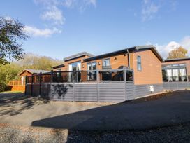 A house with a deck and fencing at 7 Lake View, Lake View 7, White Cross Bay near Windermere