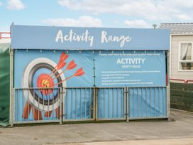 An activity range sign with safety rules at Caravan - 2 Bayside Watchet