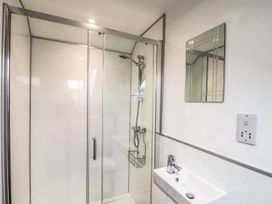 A bathroom with a shower and sink at Thomas Chambers in Camborne