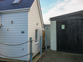 An exterior view of a house and shed at The Snug in Camborne