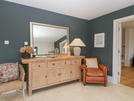 An entryway with furniture and decor at Spring View in Tetbury