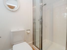 A bathroom with a toilet and a shower at Spring View in Tetbury