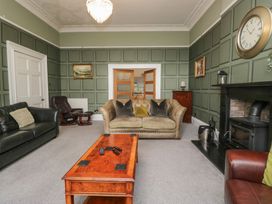 A living room with a sofa and coffee table at 8 Corkickle Whitehaven