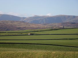A landscape with fields and stone walls at Castle Terrace, Penrith