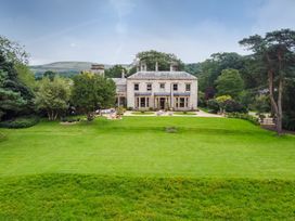 A house with garden and patio at The Country House Cumbria in Castle Carrock