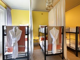 A bedroom with bunk beds at The Country House Cumbria in Castle Carrock