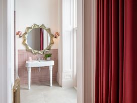 A bathroom featuring a sink and mirror at The Country House Cumbria in Castle Carrock