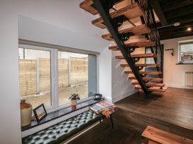 An indoor area with a staircase and window at The Loft in Glenmore, County Kilkenny