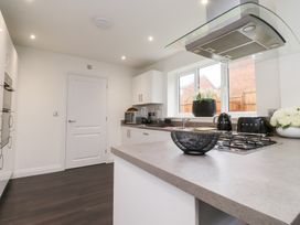 A kitchen with appliances and a countertop at 49 Mellings Place