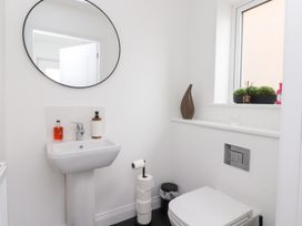 A bathroom featuring a sink and toilet at 49 Mellings Place