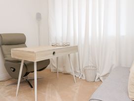 An office space with a desk and chair at 49 Mellings Place