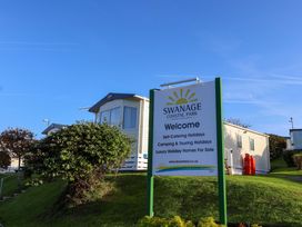 A welcome sign at Swanage Coastal Park in Swanage