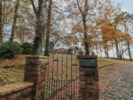 A gate with a sign at the entrance of a property at Chapel Hill in Catlowdy